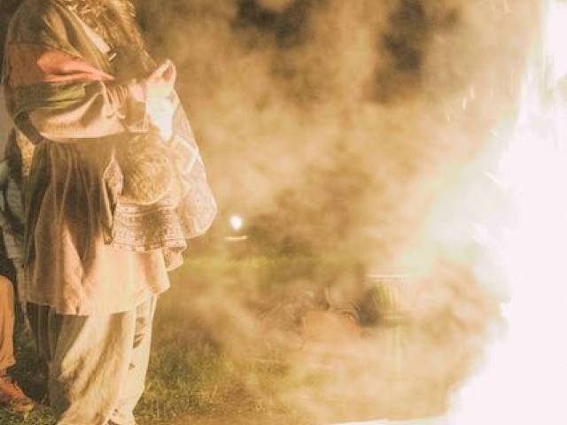 Standing in the smoke